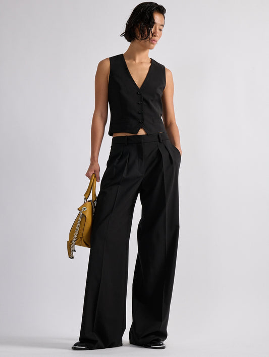 Black woollen canvas low-rise trousers